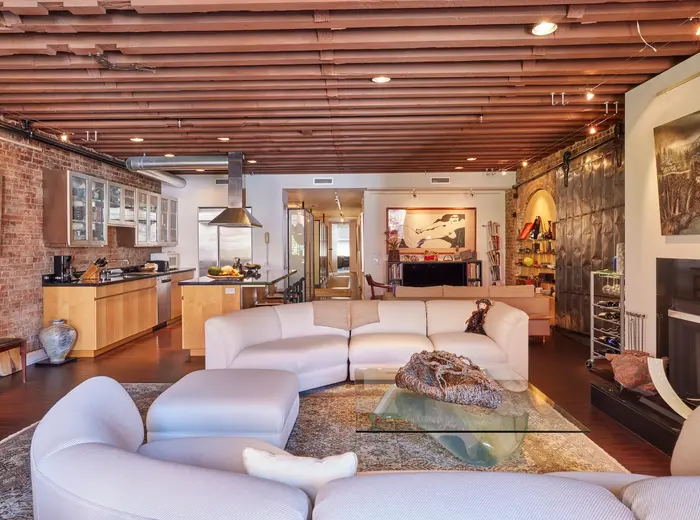 This $5.6M Tribeca condo in a former spice-grinding factory brings warmth to loft proportions