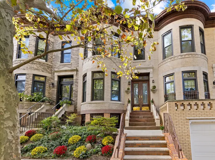 For $1.45M, this barrel-fronted Bay Ridge home offers three floors for living and lots of outdoor space