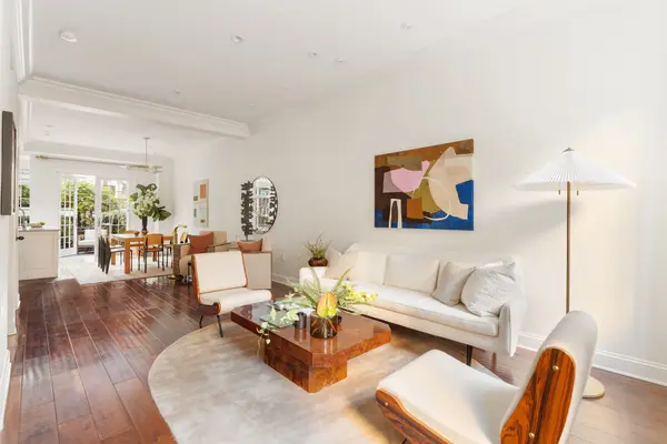 This $8.75M Village townhouse is a downtown dream home with an elevator, three terraces, and a rooftop office suite