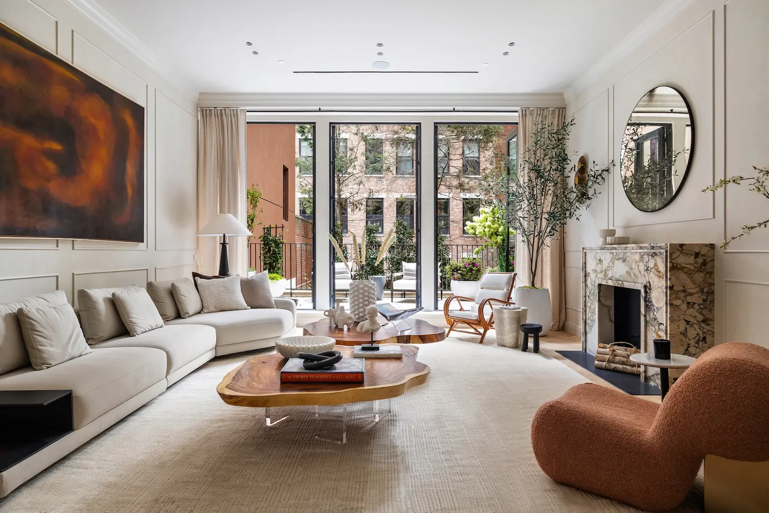 Behind a stately Village brownstone facade, a massive six-story mansion asks $35M