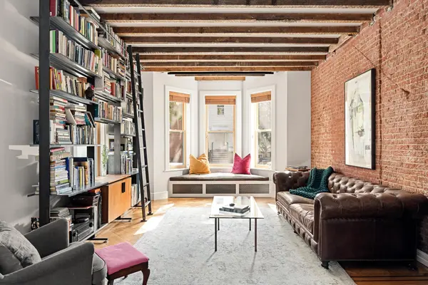 $4.9M brick townhouse offers rustic charm and outdoor space in the heart of Greenpoint