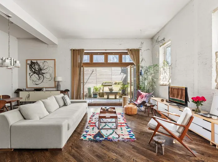 $2M Park Slope loft has a layout that's great for gathering and a private terrace for your garden